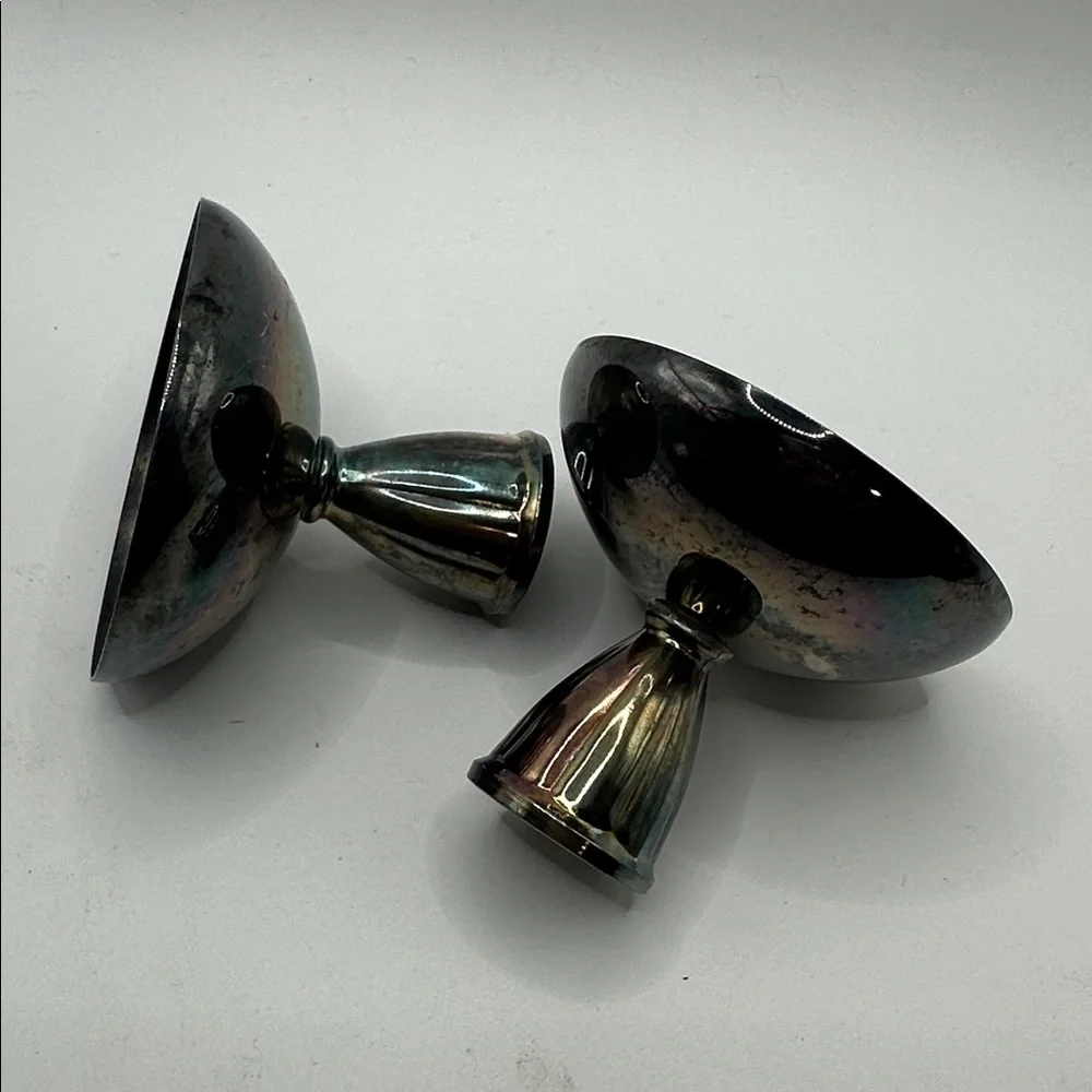 Pair of vintage Oneida Silversmiths silver-plated candle holders. Mid-century.